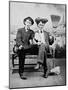 Two Young Men on a Bench with a Broom, Ca. 1900-null-Mounted Photographic Print