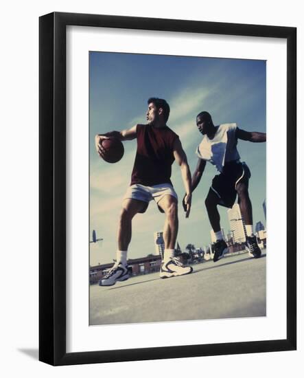 Two Young Men Playing Basketball-null-Framed Photographic Print