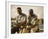 Two Young Men Sitting on The Pier Fishing-null-Framed Photographic Print