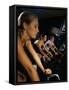 Two Young Women And a Young Man Exercising in a Gym-null-Framed Stretched Canvas