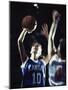 Two Young Women Playing Basketball-null-Mounted Photographic Print