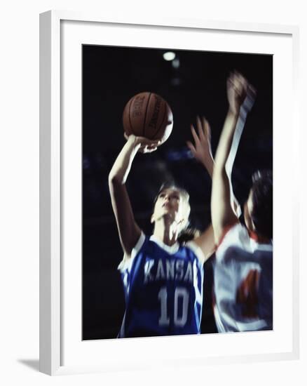 Two Young Women Playing Basketball-null-Framed Photographic Print