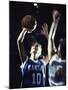 Two Young Women Playing Basketball-null-Mounted Photographic Print