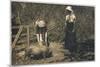 Two Young Women Tend to Pigs in Their Pen-null-Mounted Art Print