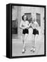 Two Young Women with Roller Blades Skating on the Road and Smiling-null-Framed Stretched Canvas