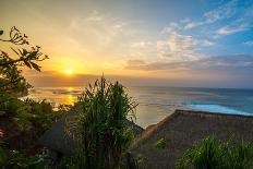 Surfers at sunset in Bali with straw roofed huts, Indonesia, Southeast Asia, Asia-Tyler Lillico-Photographic Print
