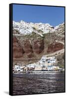 Typical Greek Village Perched on Volcanic Rock with White and Blue Houses and Windmills, Santorini-Roberto Moiola-Framed Stretched Canvas