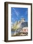 Typical house of fishermen called Rorbu framed by rocky peaks and blue sea, Reine, Moskenesoya, Lof-Roberto Moiola-Framed Photographic Print
