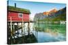 Typical House of Fishermen Called Rorbu Lit Up by Midnight Sun, Reine, Nordland County-Roberto Moiola-Stretched Canvas