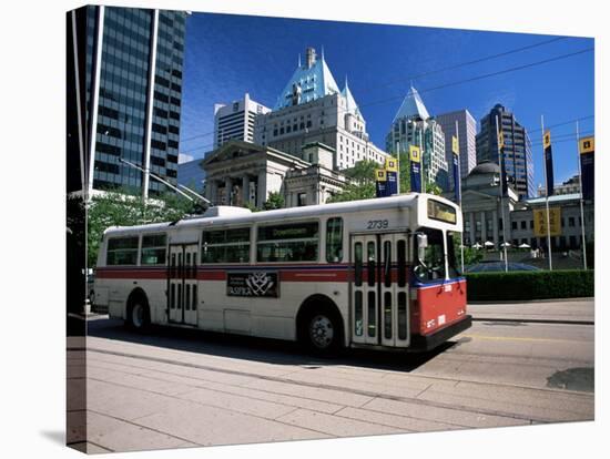 Typical Red and White Bus, Robson Square, Vancouver, British Columbia, Canada-Ruth Tomlinson-Stretched Canvas