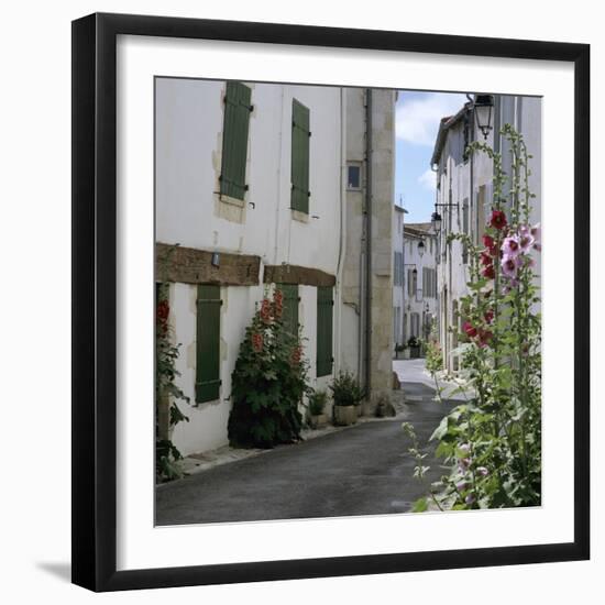 Typical Street Scene with Hollyhocks, St. Martin, Ile de Re, Poitou-Charentes, France, Europe-Stuart Black-Framed Photographic Print