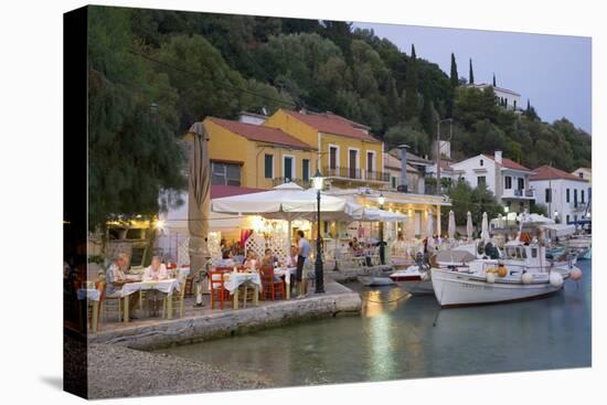 Typical Waterfront Taverna Illuminated at Dusk, Kioni, Ithaca (Ithaki)-Ruth Tomlinson-Stretched Canvas