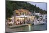 Typical Waterfront Taverna Illuminated at Dusk, Kioni, Ithaca (Ithaki)-Ruth Tomlinson-Mounted Photographic Print