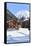 Typical wooden hut framed by woods and snowy peaks, Langwies, district of Plessur, Canton of Graubu-Roberto Moiola-Framed Stretched Canvas