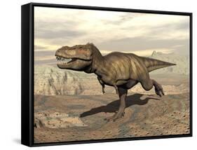 Tyrannosaurus Rex Dinosaur Running across Rocky Terrain-null-Framed Stretched Canvas