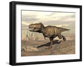 Tyrannosaurus Rex Dinosaur Running across Rocky Terrain-null-Framed Art Print