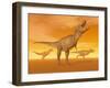 Tyrannosaurus Rex Dinosaurs in an Orange Foggy Desert by Sunset-null-Framed Art Print