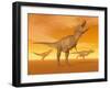 Tyrannosaurus Rex Dinosaurs in an Orange Foggy Desert by Sunset-null-Framed Art Print