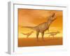 Tyrannosaurus Rex Dinosaurs in an Orange Foggy Desert by Sunset-null-Framed Art Print