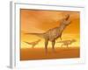 Tyrannosaurus Rex Dinosaurs in an Orange Foggy Desert by Sunset-null-Framed Art Print