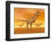 Tyrannosaurus Rex Dinosaurs in an Orange Foggy Desert by Sunset-null-Framed Art Print