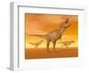 Tyrannosaurus Rex Dinosaurs in an Orange Foggy Desert by Sunset-null-Framed Art Print