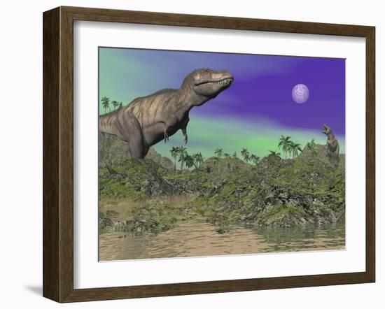 Tyrannosaurus Rex Dinosaurs in Prehistoric Landscape at Night-null-Framed Art Print