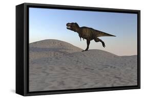 Tyrannosaurus Rex Running across a Desert Landscape-null-Framed Stretched Canvas