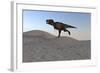 Tyrannosaurus Rex Running across a Desert Landscape-null-Framed Art Print