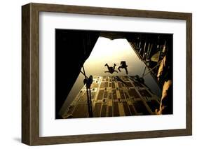 U.S. Air Force Pararescuemen Jump from an Hc-130 Aircraft Off the Coast of Djibouti-Stocktrek Images-Framed Photographic Print