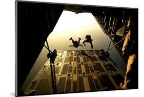 U.S. Air Force Pararescuemen Jump from an Hc-130 Aircraft Off the Coast of Djibouti-Stocktrek Images-Mounted Photographic Print