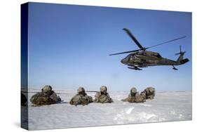 U.S. Army Paratroopers Pull Security after Exiting a Uh-60 Black Hawk-null-Stretched Canvas