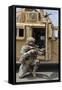 U.S. Army Soldier Shouts to a Fellow Soldier Inside a Humvee-null-Framed Stretched Canvas