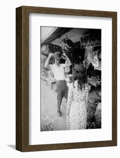 U.S Cpl. James C. Farley of Yankee Papa 13 Trying on Bush Hats, Danang, Vietnam 1965-Larry Burrows-Framed Photographic Print