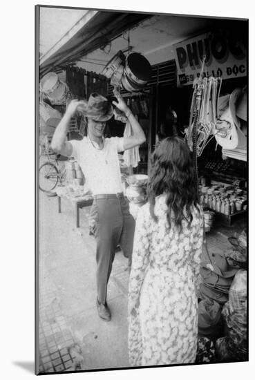 U.S Cpl. James C. Farley of Yankee Papa 13 Trying on Bush Hats, Danang, Vietnam 1965-Larry Burrows-Mounted Photographic Print