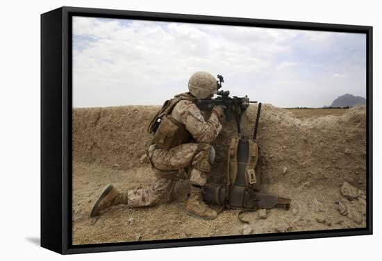 U.S. Marine Provides Security from Behind a Mud Wall-null-Framed Stretched Canvas