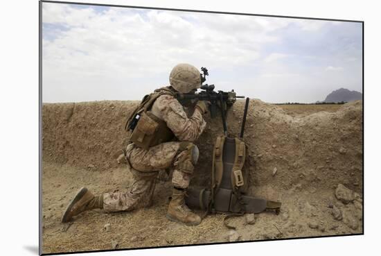 U.S. Marine Provides Security from Behind a Mud Wall-null-Mounted Photographic Print