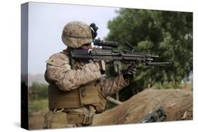 U.S. Marine Provides Security with an M249 Squad Automatic Weapon-null-Stretched Canvas