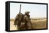 U.S. Marine Takes Cover Behind a Wall During a Patrol in Afghanistan-null-Framed Stretched Canvas