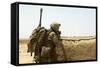 U.S. Marine Takes Cover Behind a Wall During a Patrol in Afghanistan-null-Framed Stretched Canvas