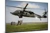 U.S. Marines Prepare to Attach Cargo under a Uh-60 Black Hawk-null-Mounted Photographic Print