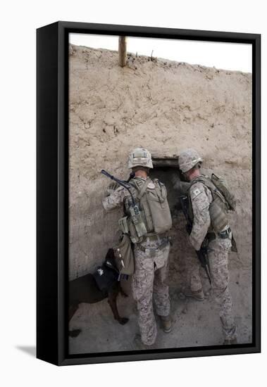 U.S. Marines Push Down a Wall in an Empty Compound-null-Framed Stretched Canvas
