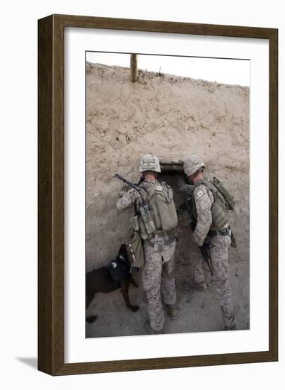 U.S. Marines Push Down a Wall in an Empty Compound-null-Framed Photographic Print