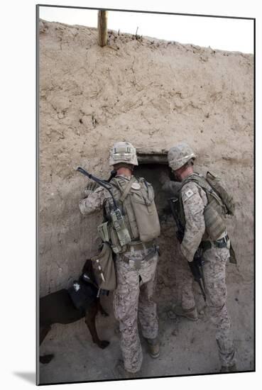 U.S. Marines Push Down a Wall in an Empty Compound-null-Mounted Photographic Print