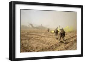 U.S. Marines Sprint across a Field to Load onto a Ch-53E Super Stallion-null-Framed Photographic Print