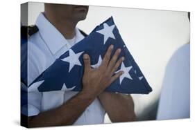 U.S. Navy Commanding Officer Holds the National Ensign-null-Stretched Canvas