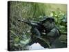 U.S. Navy SEAL Crosses Through a Stream During Combat Operations-Stocktrek Images-Stretched Canvas