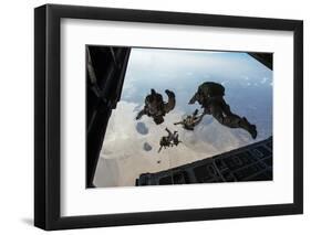 U.S. Pararescuemen and U.S. Marines Jump from a Hc-130 over Djibouti-Stocktrek Images-Framed Photographic Print