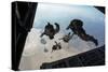 U.S. Pararescuemen and U.S. Marines Jump from a Hc-130 over Djibouti-Stocktrek Images-Stretched Canvas