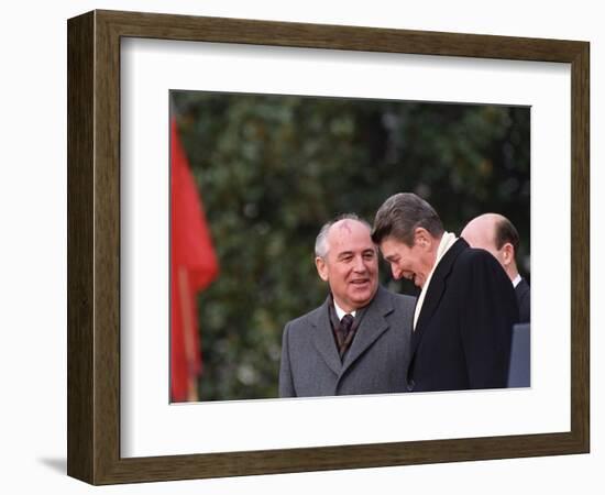 U.S. President Ronald Reagan, Right, Talks with Soviet Leader Mikhail Gorbachev-null-Framed Photographic Print